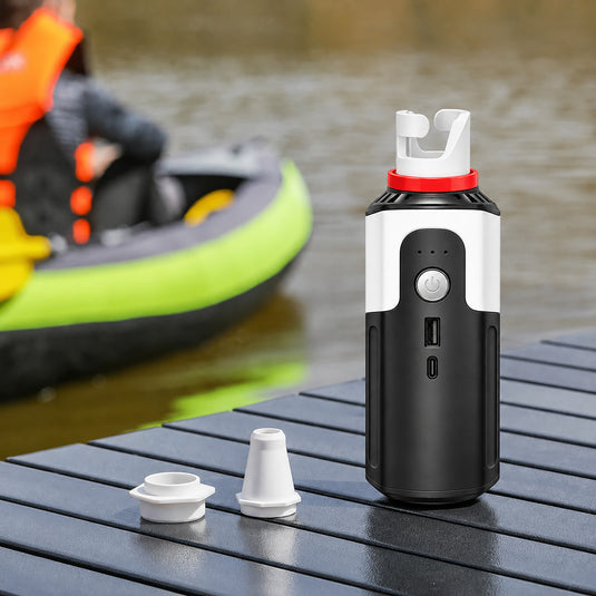 A Quest High Flow Pump portable power bank in black and white with a red collar and white top cap, shown on a solid white background.