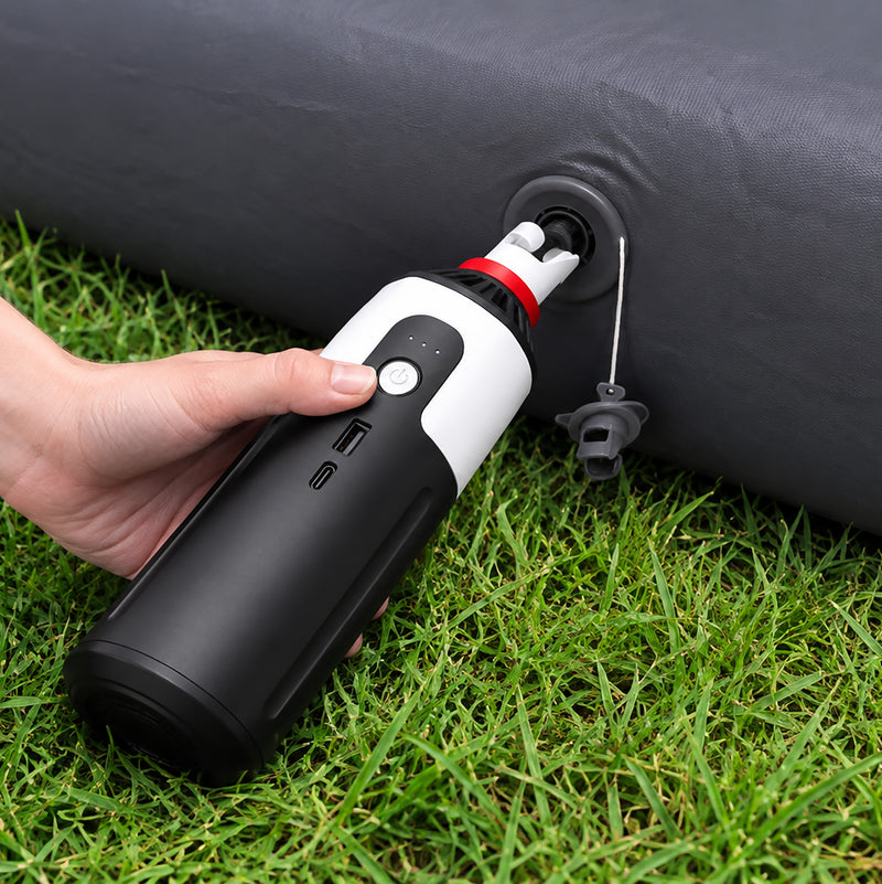Load image into Gallery viewer, A Quest High Flow Pump portable power bank in black and white with a red collar and white top cap, shown on a solid white background.