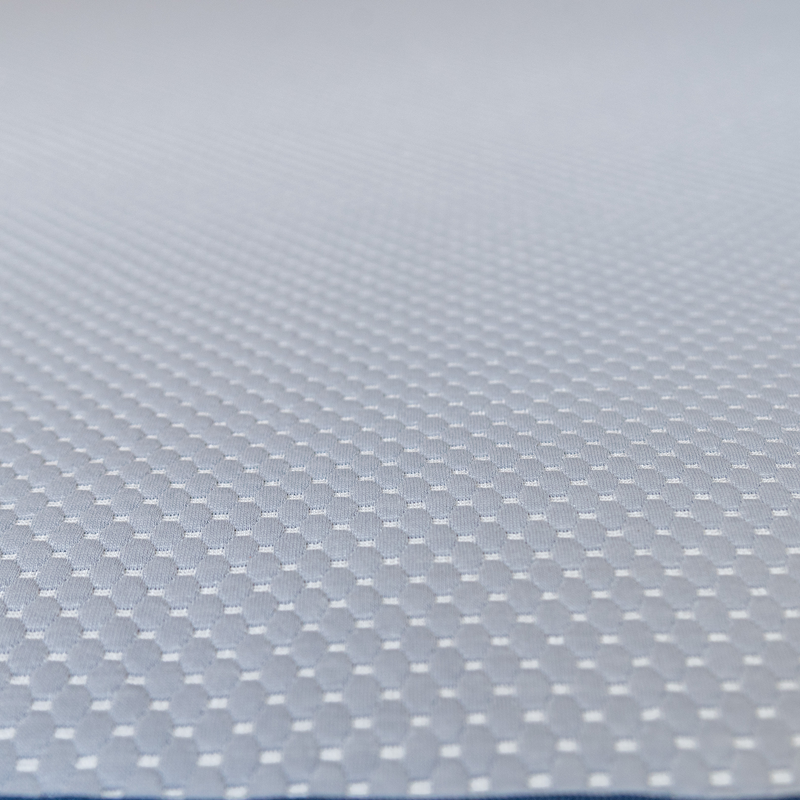 Load image into Gallery viewer, Close-up of a light gray textured surface with a repeating small hexagonal or dotted pattern, filling the frame.