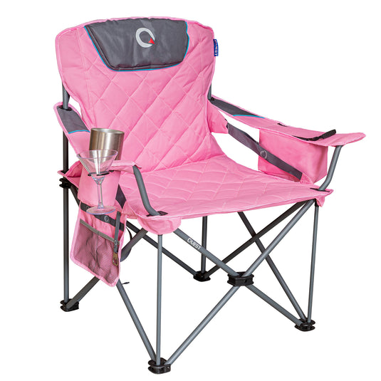 A pink quilted outdoor folding camp chair with gray metal legs, a gray headrest, and a side pocket holding a clear cup, shown on a plain white background.